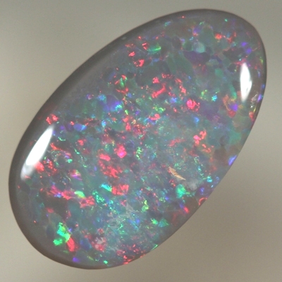 SOLID SEMI BLACK OPAL Bright sparkling reds over green and blue
